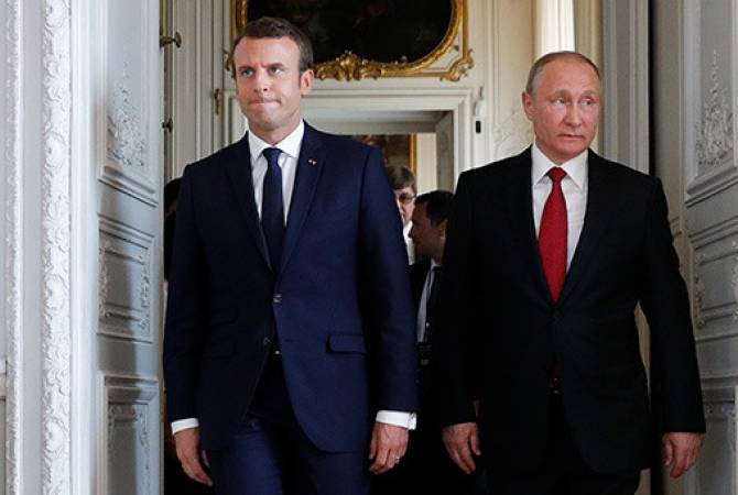 Poutine et Macron appellent à un arrêt «complet» des combats