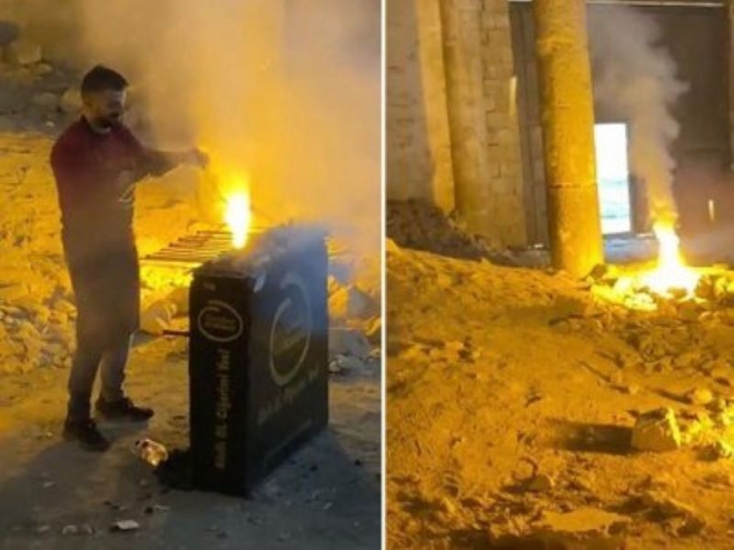Des Turcs allument le feu pour faire une brochette dans une église arménienne délaissée après le génocide à Ourfa (Turquie)